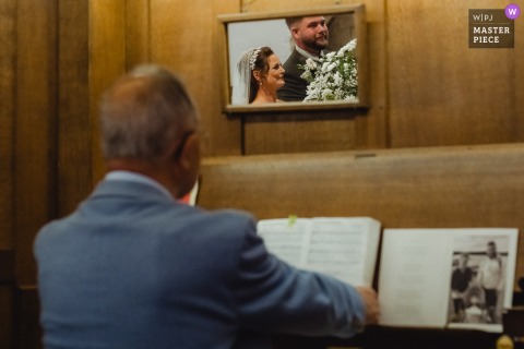   In Kent, the bride and groom’s faces appear together in the reflection of the organist’s mirror during the ceremony, adding a unique visual touch to their wedding day.