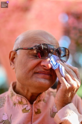   Tears well up as the bride’s father is swept with emotion during the chooda ceremony at Hyatt Regency in Chandigarh, memories of his daughter’s childhood coming to the forefront.