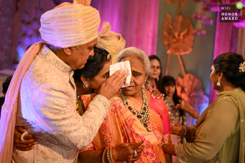 The bride’s parents at Trident, Mumbai, become tearful as the emotional significance and closeness of their family shines through every wedding day moment.