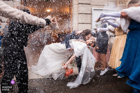 At The Isère Church Exit, Guests Throw Rice As The Newlyweds Move Through A Bright Storm When the guests throw rice at the Isere church exit after the ceremony, the newlyweds move through a bright storm of blessing, motion, and jubilant disorder.