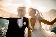 A sophisticated Stresa wedding portrait of the Italy couple at Hotel La Palma on the water at the sunset A sophisticated Stresa wedding portrait of the Italy couple at Hotel La Palma on the water at the sunset