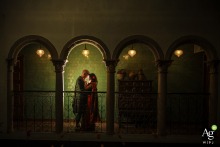 Bride and groom backlit in an archway at Arta Glasgow.