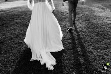 During a quiet pause in their couple's session at a reception venue in Poitiers, Vienne, the bride and groom share an intimate and artistic moment away from the festivities.