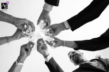 Alessandro toasts with friends and parents at home in Biella, Italy, before wedding ceremony.