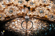 Glamorous high-heel shoes at the Grand Victoria Hotel, Taipei, Taiwan, featuring a sparkling ring placed upon them.