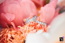 The wedding rings are prominently featured within the bride's bouquet in this close shot from her home in Versailles Yvelines.
