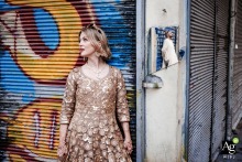 Broken Street Mirror Creatively Reflects Groom as Couple Wanders Old Town of Tahtakale, Eminonu, Istanbul Wandering through the Old Town in Tahtakale, Eminonu, Istanbul, a couple’s session is creatively mirrored by the fractured reflection of the groom in a broken street mirror.