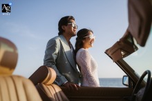 In Malibu, California, the couple pauses to soak up the sunshine during their elopement, creating a relaxed and intimate portrait that embraces the beauty of the coastal landscape.