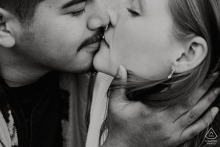 At Rob Wallace Park in Midland, NC, a tight shot captures a passionate kiss, his hand gently pulling her in by the neck, emphasizing their deep connection and intimacy.