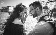 In Ceparana-Bolano, the groom gently places his hand on his bride's cheek, capturing a tender, romantic moment.