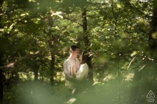 Engaged Couple's Pre-Wedding Portrait Embraced By Nature In Trezzo Sull'Adda Forest Engaged couple's pre-wedding portrait in Trezzo sull'Adda forest, surrounded by nature.