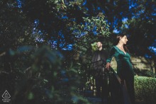 At the Hungarian Cultural Garden in Cleveland, OH, the couple stands apart, each illuminated by their own spotlight of dappled sunlight filtering through the trees at day's end.