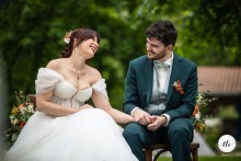 At Domaine St Jean de Chépy in Tullins, Isère, France, love is openly shared between the couple during their ceremony, creating a touching and memorable scene.