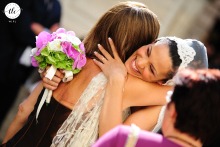 In Rome at Basilica Santa Maria Sopra Minerva, the bride receives a heartfelt hug from her best friend after the ceremony, cherishing the importance of friendship on this special day.