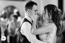 At Baronesse Tacco in San Floriano del Collio, Gorizia, Italy, the bride tenderly wipes away the groom’s tears as they share an emotional first dance together.