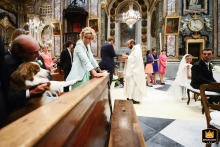 Pews for Paws: A family's beloved dog attends a wedding ceremony at Church in Bra, located in Cuneo, Italy.