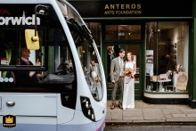 At Anteros Art, Norwich, the bus driver gives the newlyweds a congratulatory thumbs up, adding joy to their special day.