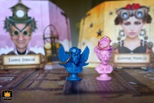A wedding photo at the bride's parents' home in L'Isle Jourdain, France; rings rest on game figurines.