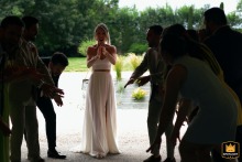 Domaine du T, Balma, France: Bride gets emotional support from witnesses before dining room entry.