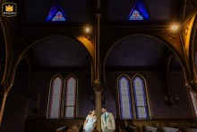 At New Restauration Church, Yarmouthport, Massachusetts, a quiet, playful glance between ancient stained glass windows and wooden arches becomes a lasting memory.