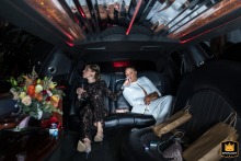 Driving from Santa Ynez to Santa Barbara, a couple shares a smoke in the back of their limo, captured by a WPJA photographer.