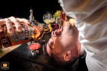 Groom and friends share a whiskey at a bar in La Arbolada Funes, Santa Fe