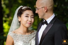 Posed wedding photo of a couple in a garden at the Emory Conference Center in Atlanta, Georgia.
