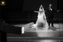 Dance Studio in Reggio Emilia, Italy, is the scene as the newlyweds make a meaningful, dramatic entrance in their formal wedding attire at the place they first met.