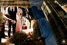 Shot from the back seat of the car, the bride gets into the wedding car as the groom prepares to drive her home at the entrance of her house in Taiyuan, Shanxi.