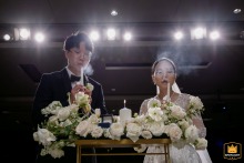 Virginia, KCPC, where the bride and groom after lighting the unity candle, each gently blowing out their individual ceremonial taper candles.