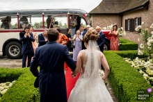 West Flanders Wedding Photographer: "The bride and groom walked through the door and they gave the first look to the family. Just love the reactions and happiness on the faces of their family."