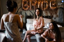 At the Enjoy Hotel in Sakarya, NG, the bride was caught up in the excitement of her wedding day, surrounded by her bridesmaids and sharing in the gossip they were sharing