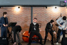 At BRICK YARD 33 1/3 in Taipei, Taiwan, wedding guests eagerly attempt to catch airborne hotdogs with their mouths.