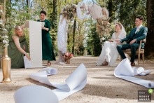   At a ceremony in Macon, the witness's speech unexpectedly slips off the table, adding a spontaneous and amusing touch to the proceedings.