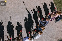 At Schloss Gimborn in Marienheide, Germany, wedding guests wait for the couple to exit the castle. The award-winning top-down photograph, with long shadows cast by the sun, highlights the photographer’s skill at documenting anticipation.