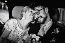 In the backseat of a car in Yvelines, France, a newlywed couple shares a moment of complicity. The award-winning black-and-white photo highlights the photographer’s skill at documenting intimate, joyous moments.