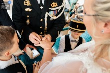 Wedding Rings Exchange: A Child's Playful Interruption at a Versailles Civil Ceremony