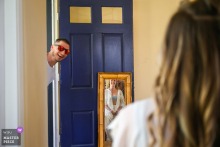 Hope, Idaho Wedding: Friend Enthusiastically Greets Bride During Pre-Ceremony Preparation At the bride’s home in Hope, Idaho, a dear friend bursts in enthusiastically to greet the bride as she gets her hair and makeup done before the wedding.