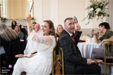   Laughter and puzzled expressions fill St Albans Museum & Gallery as the bride and groom play a humorous game of Mr & Mrs during the wedding speeches, entertaining their guests.