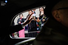   As the bride and groom leave Le Pont Church at Temple Le Pont, Lac de Joux, Switzerland, they are greeted by friends and family, marking a joyful transition into their new life.