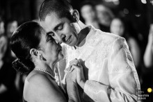   During the reception at Salvage One in Chicago, IL, a tender moment unfolds between mother and son as they share a heartfelt dance together in front of wedding guests.