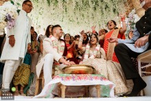 At Hotel du Vin in London, guests participate in lively Hindu wedding games, bringing joy and tradition to the celebration.