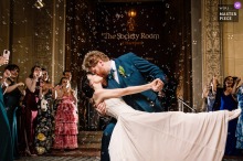 Guests Blow Bubbles As The Couple Exits The Society Room In Hartford, Connecticut At The Society Room in Hartford, Connecticut, the couple exits for the night through family and friends blowing bubbles, and the farewell feels airy, theatrical, and sweet.