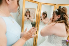 At Vellano Estate in Chino Hills, California, the bride grows emotional while getting ready, her private pause revealing how weddings can press memory, hope, and nerves into one frame.