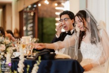 At Old Ranch Country Club in Seal Beach, California, the groom wipes tears from his face during a toast, a raw and human interruption in the polished evening.