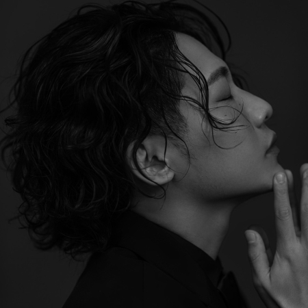 Black and white studio portrait of wedding photographer Pao Cai from Taiyuan, Shanxi, China