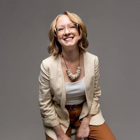 Studio portrait of wedding and elopement photographer Erica Hilliard