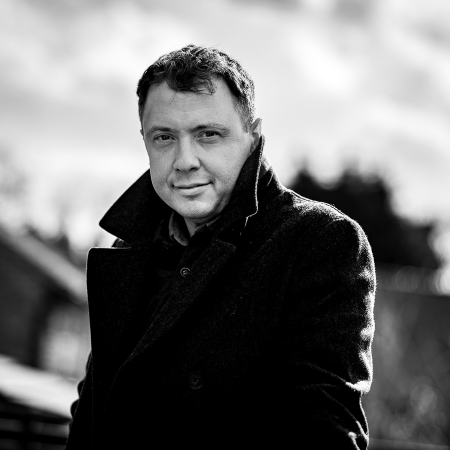 Lifestyle portrait of GMT wedding reportage photographer Jim Ross of the UK