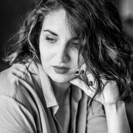 Black and white portrait of wedding and elopement photographer Lorene Serfati Engagement, wedding and elopement pictures by Lorene Serfati