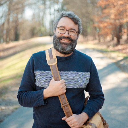 Lifestyle portrait of wedding photographer Tom Waldenberg